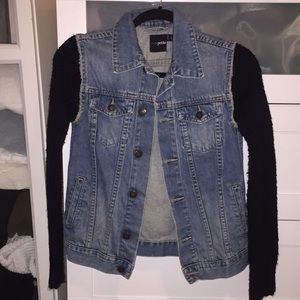 Denim jacket with knit sleeves